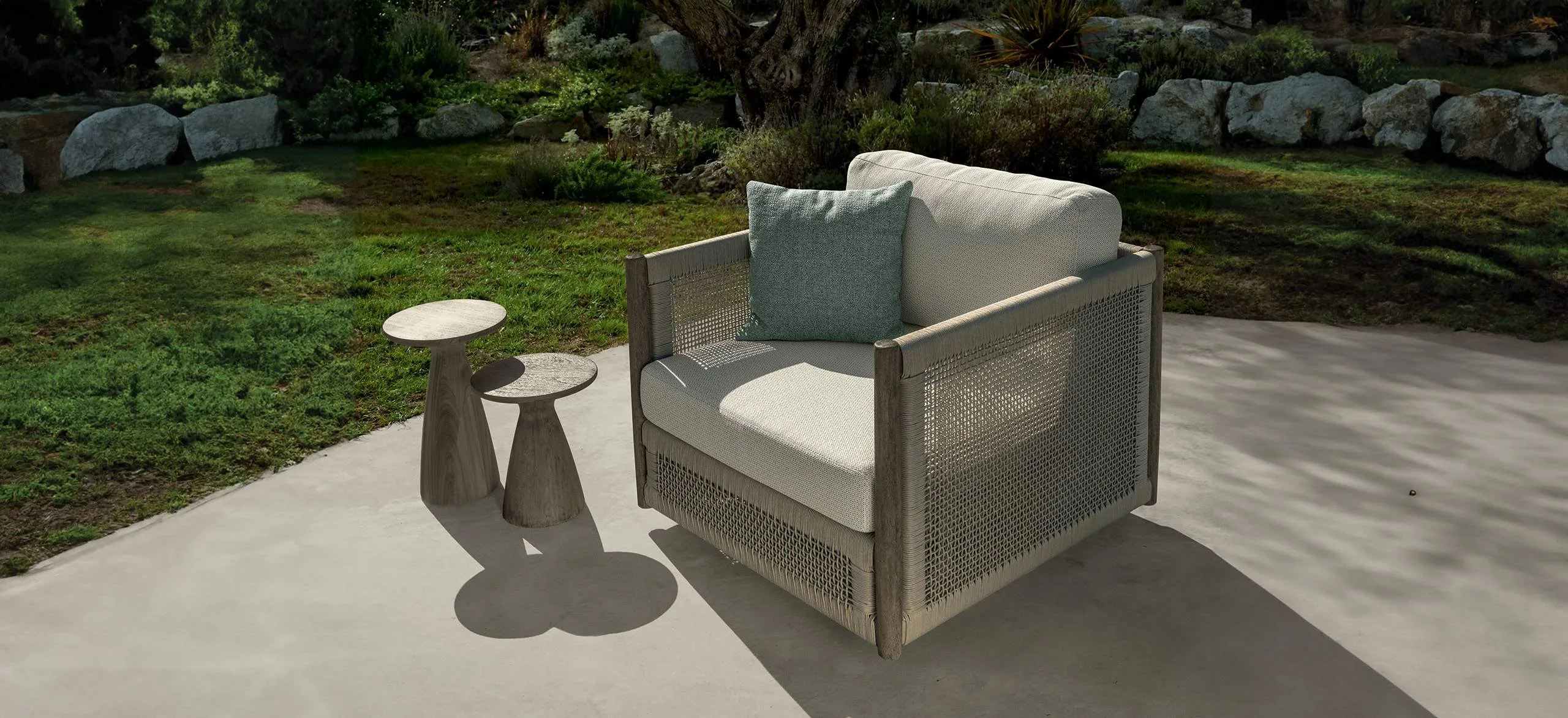 A Talenti Dolcevita dining set under an olive tree